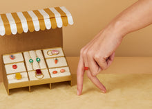 画像をギャラリービューアに読み込む, 複数の種類の金のアクセサリーがおかれている